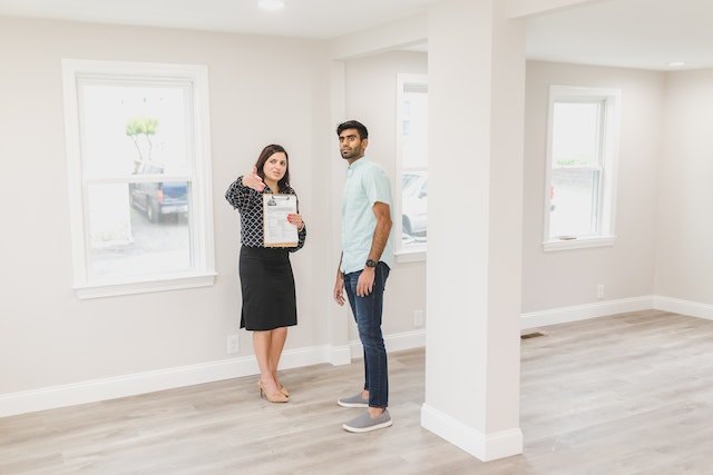 landlord showing home to tenant